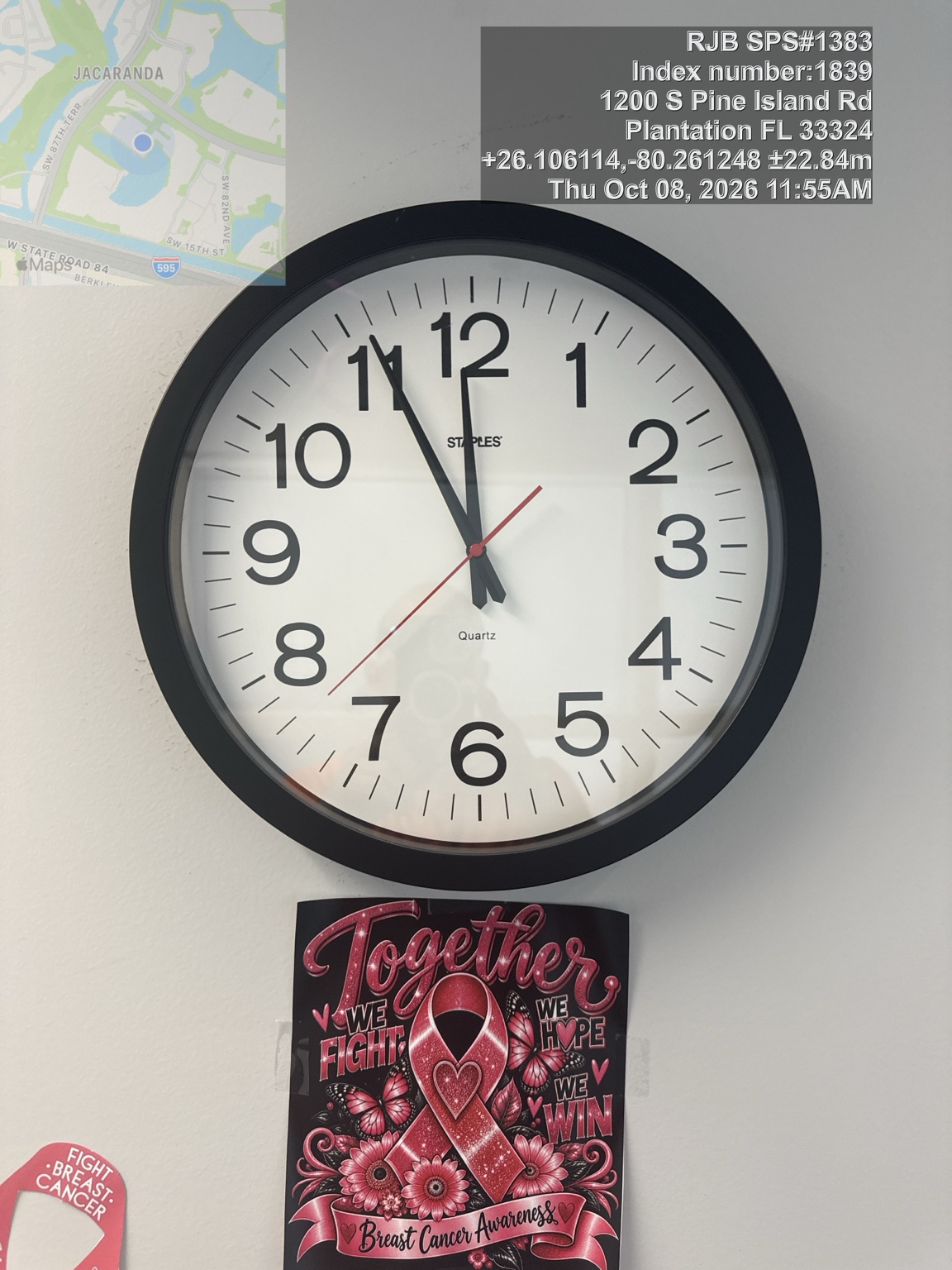 Clock — photo timestamp October 8, 2026, 11:55 AM Eastern